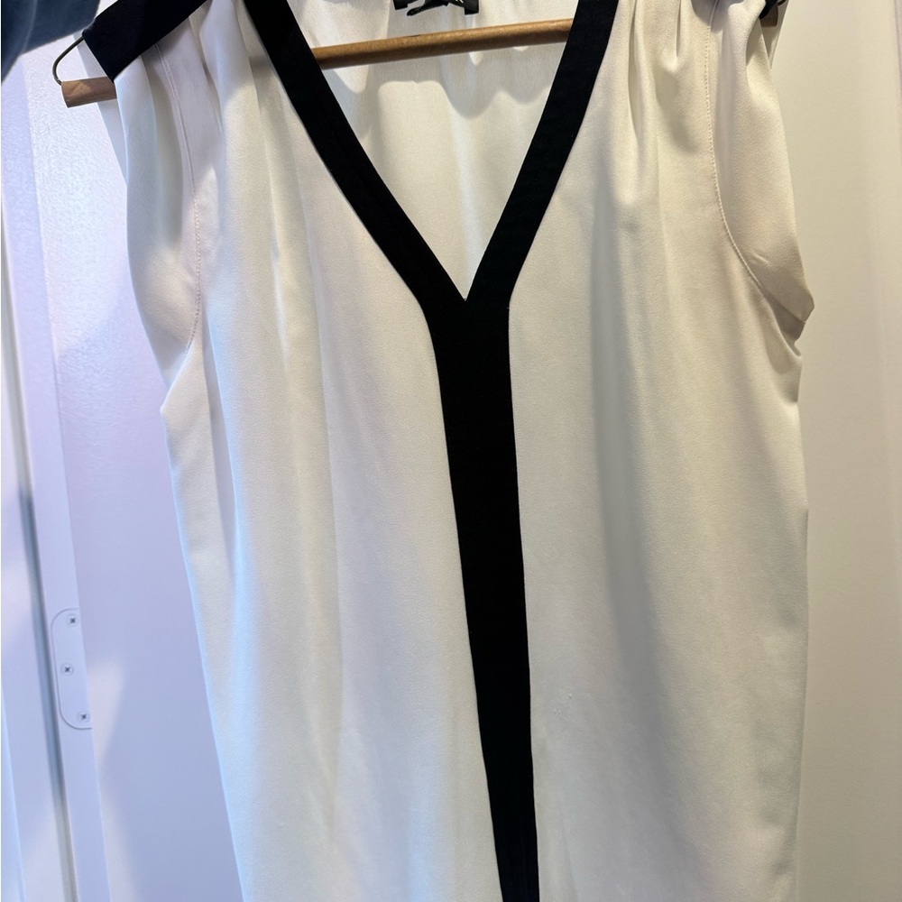 A lot of women’s blouses, like new condition.